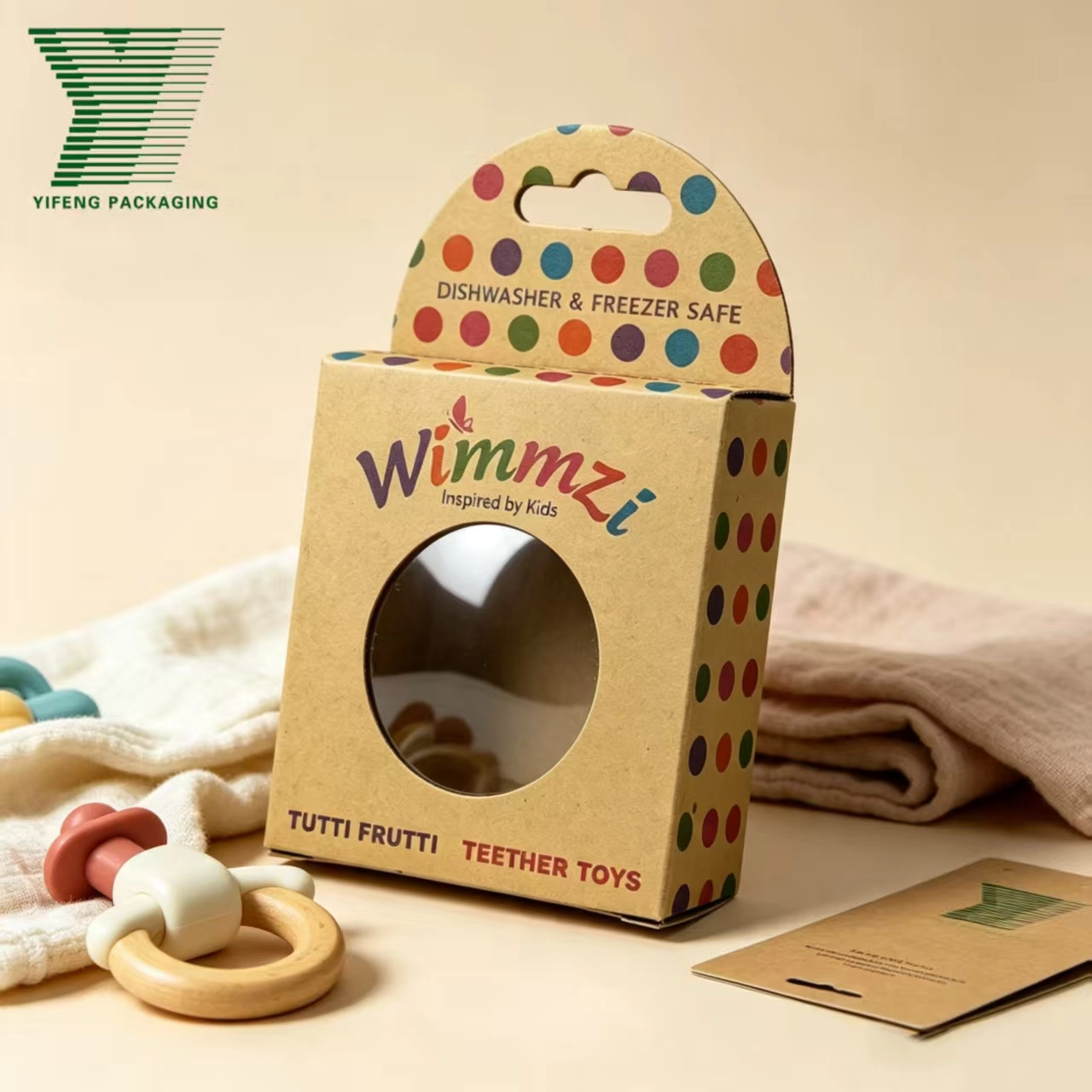 Wimmzi Tutti Frutti Teether Toys cardboard packaging with colorful polka dots. - Yifeng Packaging