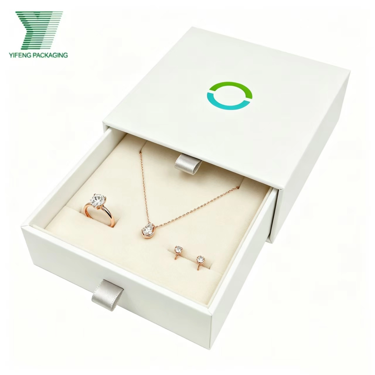 White slide-out jewelry box with a rose gold ring, necklace, and earrings. - Yifeng Packaging
