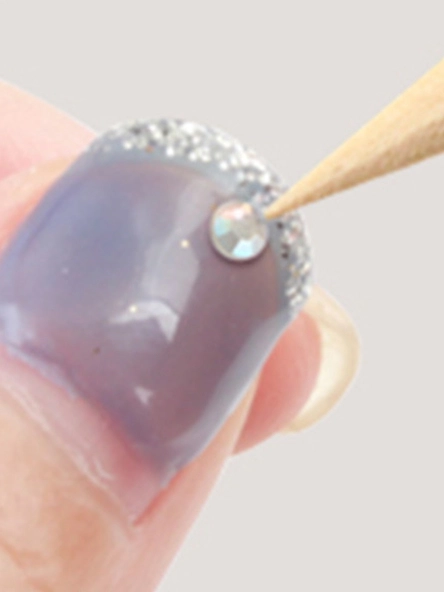 clean nail gaps wooden stick